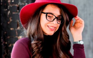 portrait smiling beautiful young woman with pink hat black eyeglasses 1
