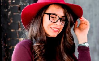 portrait smiling beautiful young woman with pink hat black eyeglasses 1