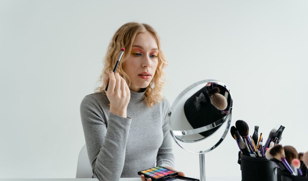 Free Woman Holding Eye Makeup Brush Stock Photo